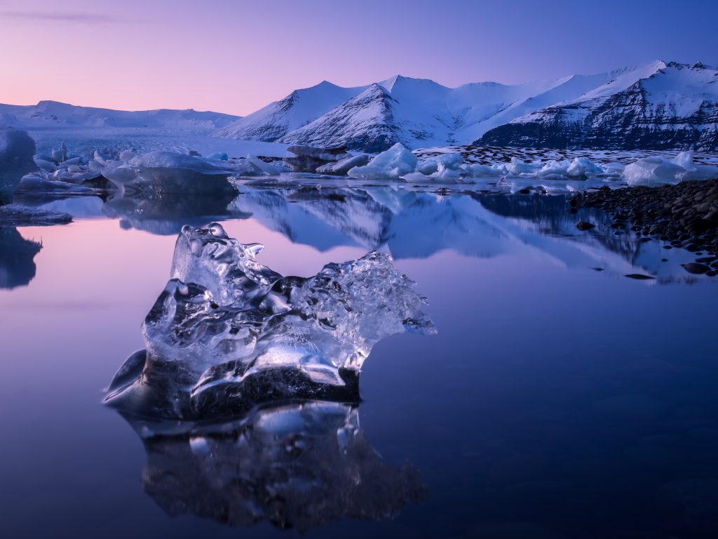 Lone Iceberg floating in the glacier lagoon Jökulsárlón. Located in Iceland